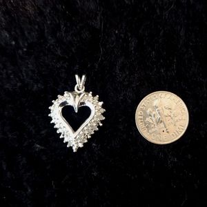 Heart shaped diamond pendant